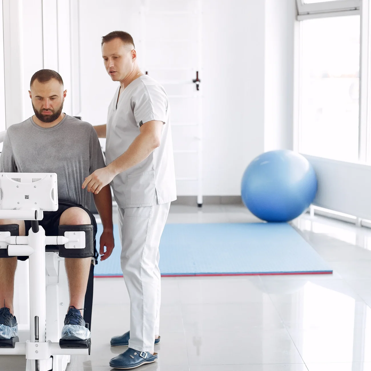 Physiotherapist treating a patient